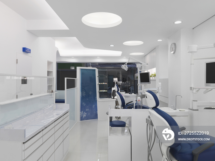 Dentist room and treatment chairs in modern office