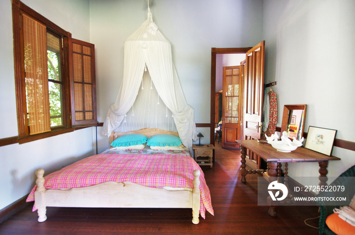 Bed and sideboard in bedroom