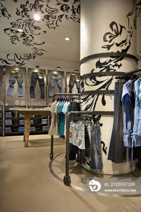 Clothes displayed in contemporary clothing store