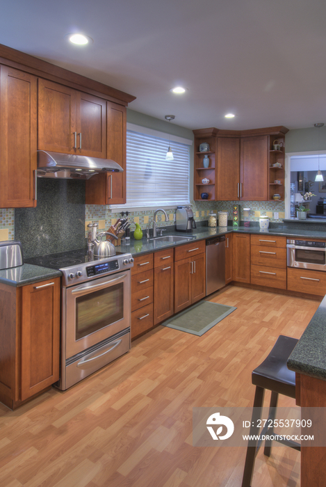 Kitchen counter with hardwood floor in contemporary house; Berkeley; California; USA