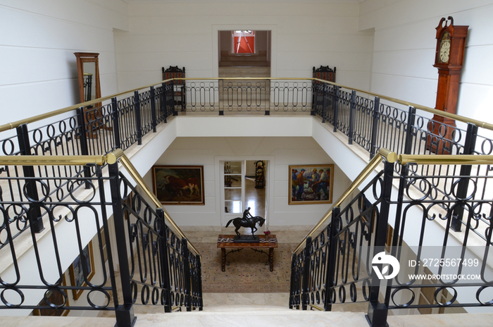 Railings leading to stairway in house