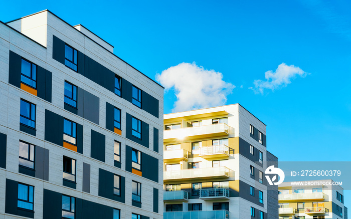 Apartment in residential building exterior. Housing structure at blue modern house of Europe. Rental