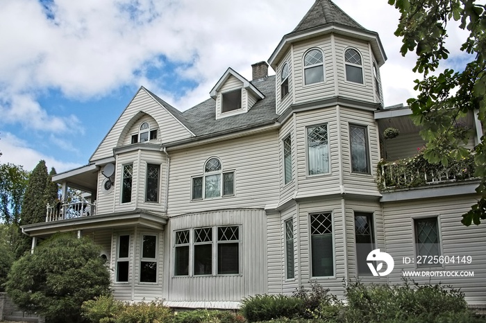 Traditional White Victorian House