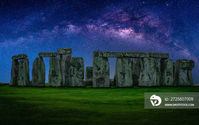 Landscape image of Milky way galaxy at night sky with stars over Stonehenge an ancient prehistoric s
