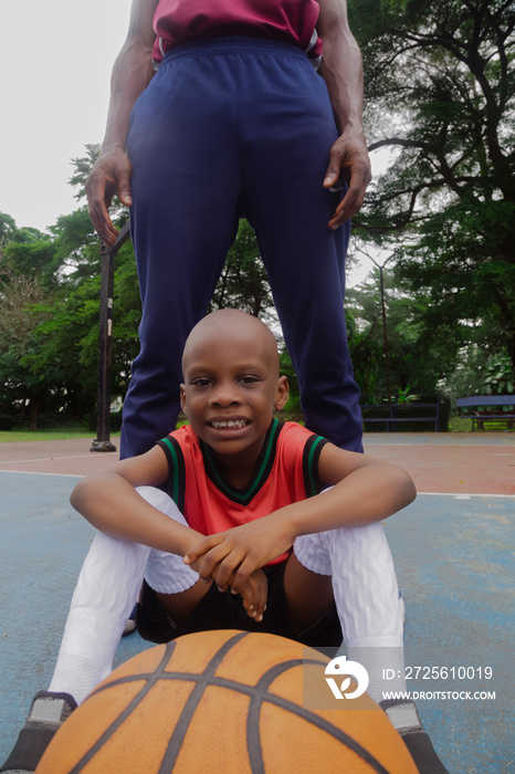 Parent and child on the basketball court