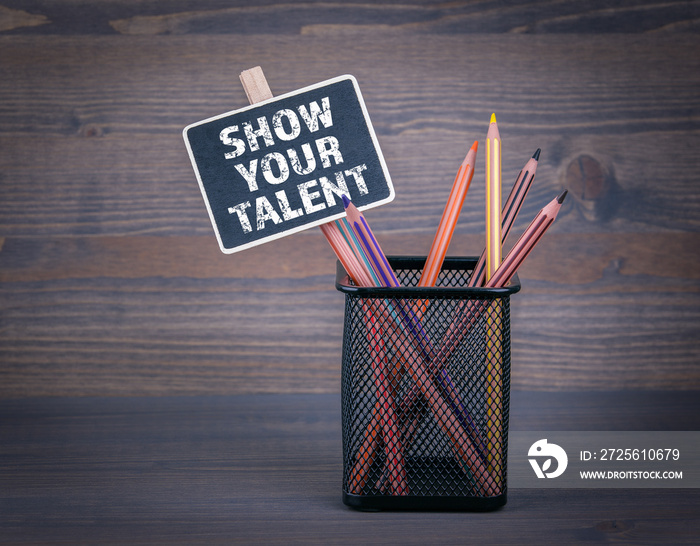 Show your talent. Small blackboard chalk and colored pencil on wood background