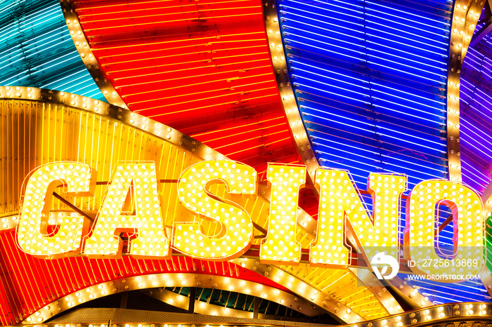 Neon casino sign lit up at night