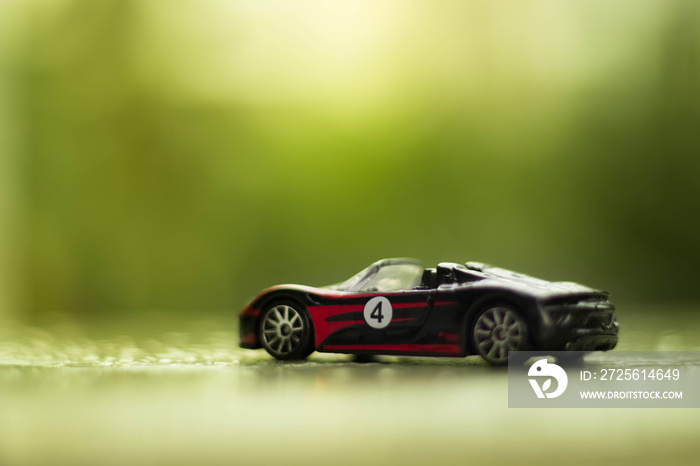 Hot wheels toy car over blurred background