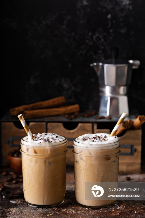 Iced coffee macchiato in two mason jars