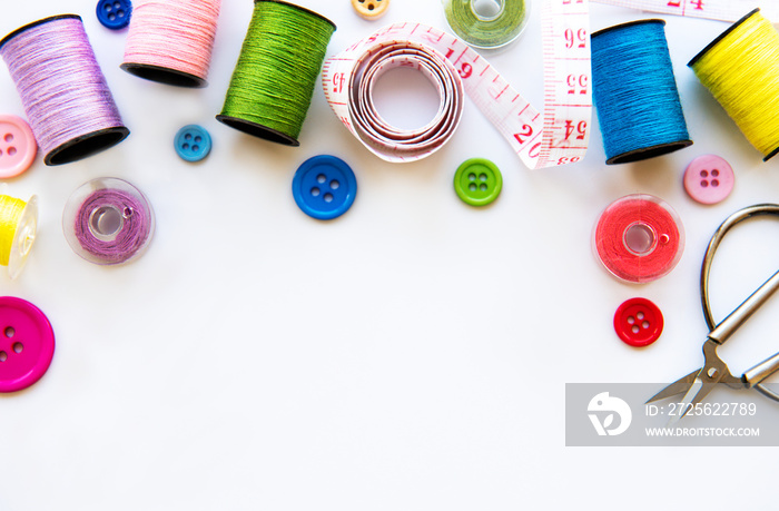 Sewing accessories on a white background