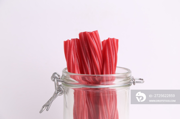 sweet red gummy licorice in color background