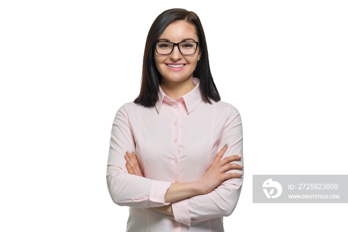 Portrait of young confident smiling woman in glasses with folded hands on white isolated background