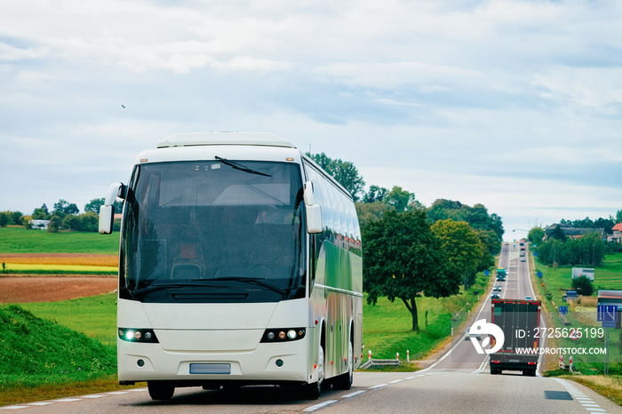 White Tourist bus on road Poland