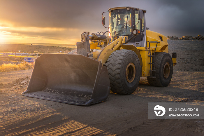 Excavator working on the expansion works of the Segovia bypass road in Spain