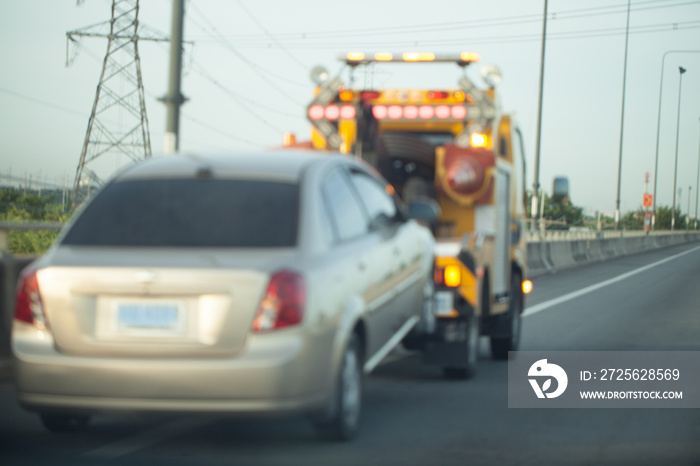 Towing a trailer on the highway.