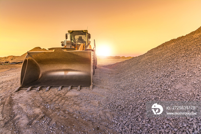 Excavator on the road construction works. Machinery needed for construction