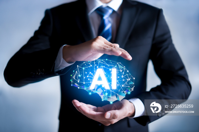 AI（人工智能）概念。商人手持抽象的大脑结构。