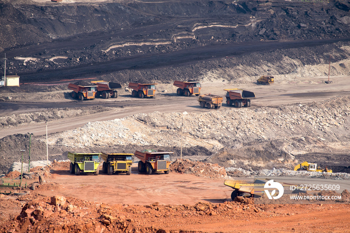 Part of a coal mine pit with big mining truck working