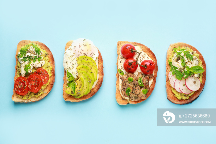 Tasty sandwiches on color background