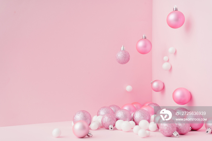 创意圣诞设计粉红色柔和的背景。新年概念。