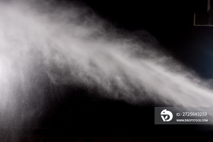 water spray of high pressure water jet on black background