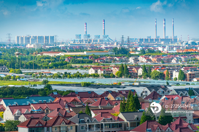 Industrial factories and nearby homes in Shanghai, China