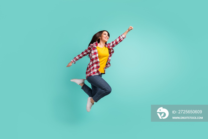 Full length body size view of attractive cheerful girl jumping striving purpose isolated over bright