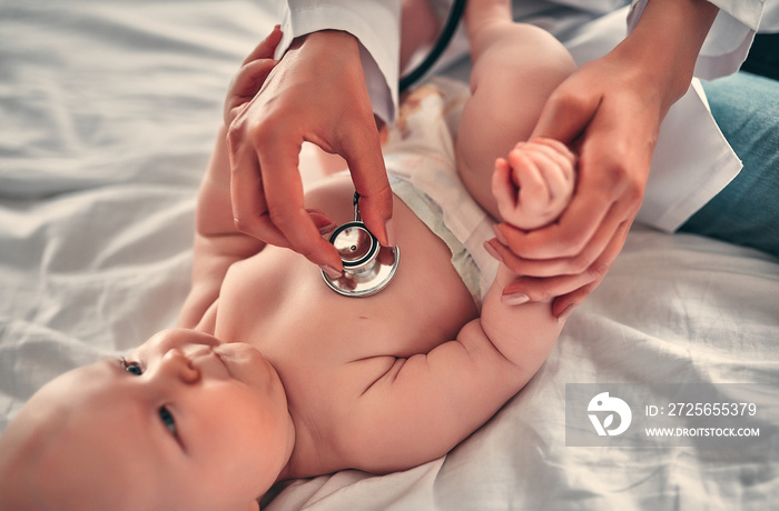 Doctor with newborn baby