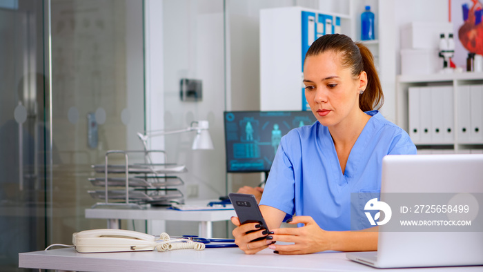 Medical nurse consulting patient online using smartphone, explaining treatment for disease. Therapis