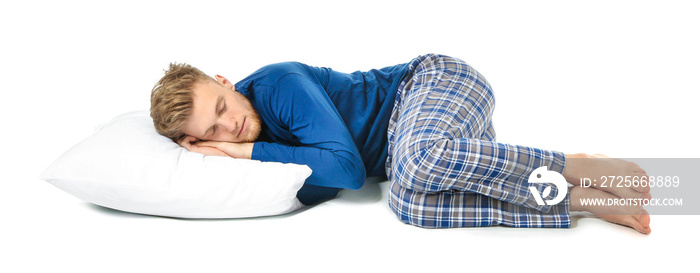 Handsome sleeping man with pillow on white background