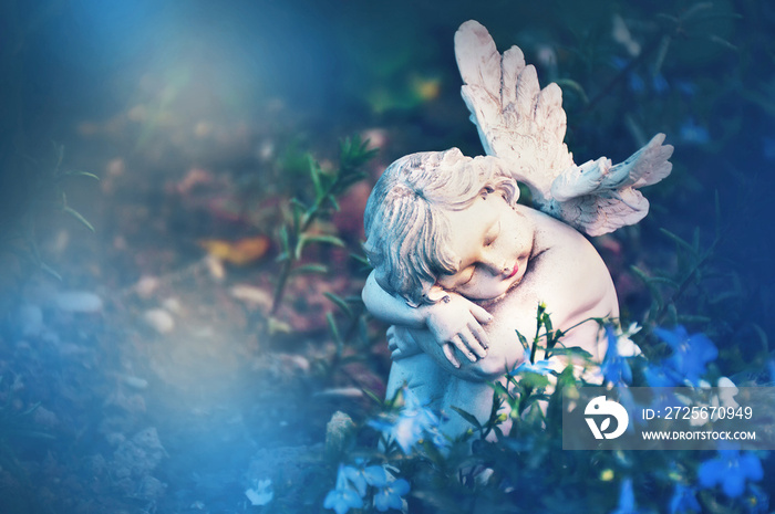 Guardian angel sleeping in flowers