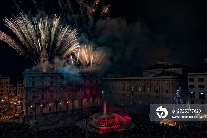 Happy new year fireworks on black background in genoa, italy