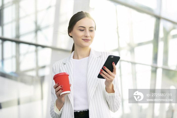 Business Woman Using Phone Near Office