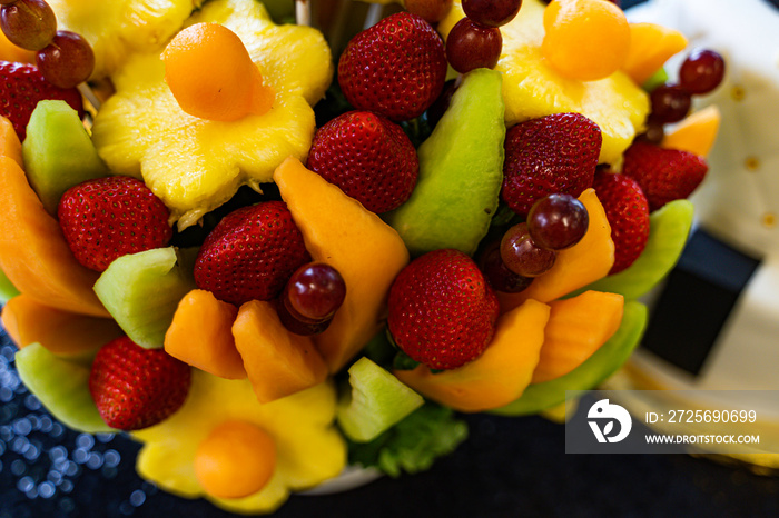 Edible Fruit basket arrangement with a variety of fruits