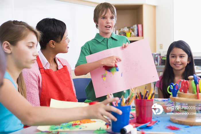 Elementary pupil discussing picture