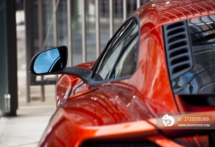 Detail of an orange sports car