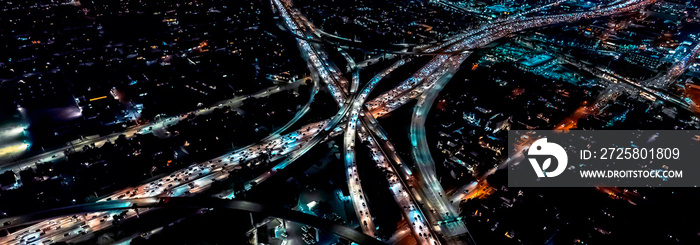 Aerial view of a massive highway in Los Angeles, CA at night