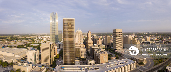 Aerial panorama of downtown Oklahoma City at dawn.