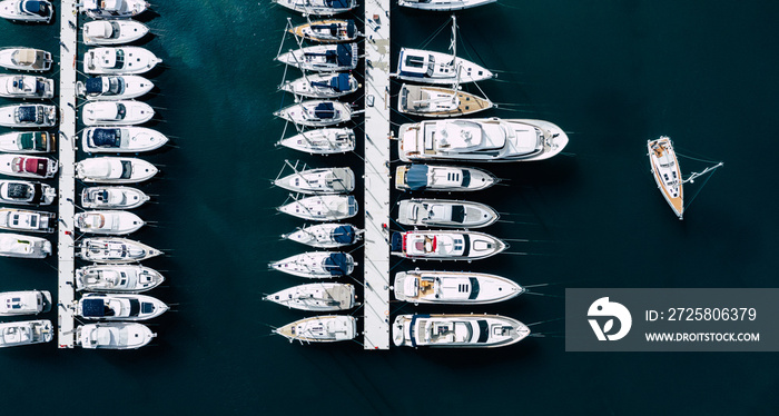 Aerial View of Yacht Club and Marina. White Boats and Yachts. Photo made by drone from above.