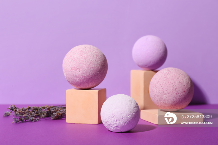 Composition with lavender bath bombs on color background