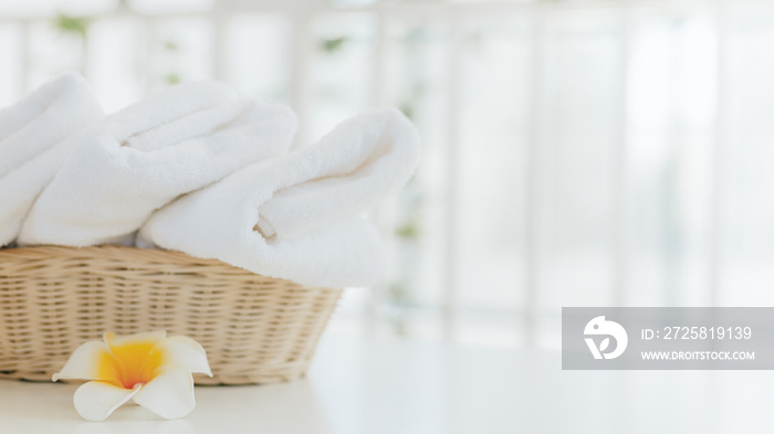 White towel with basket in bathroom