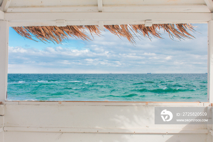 View from the window of the bungalow on the sea landscape. Concept Vacation at sea in the summer.