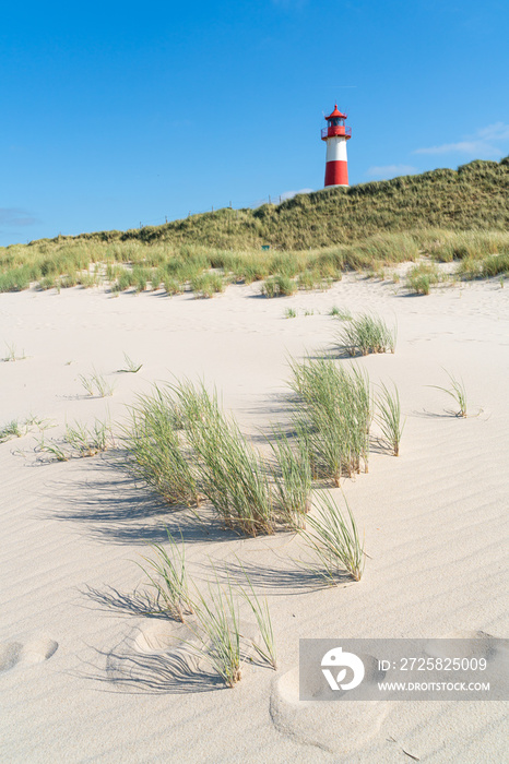 Lighthouse red white on dune. Sylt island – North Germany.  