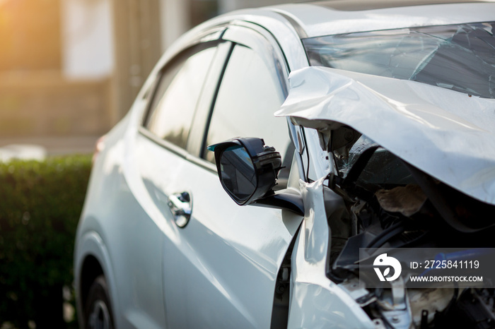 Car crash accident on the road. Sheet metal damage to cars. Broken passenger car close-up.