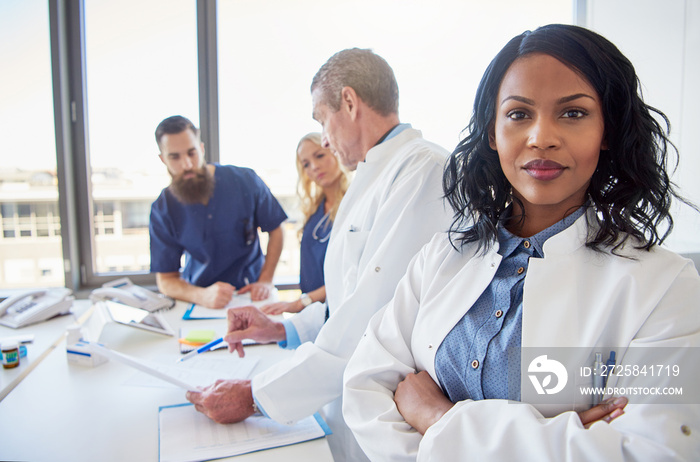 Black female doctor looking at camera during the brief