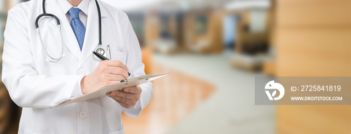 Cropped shot of a male doctor holding a medical chart at the hospital