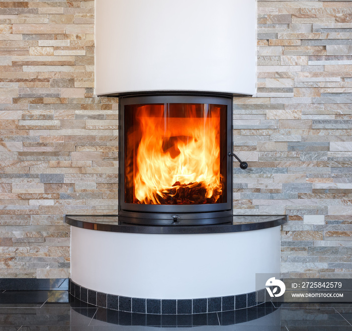 An interior shot of a modern marble fireplace