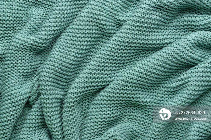 Texture of crumpled knitted fabric as background