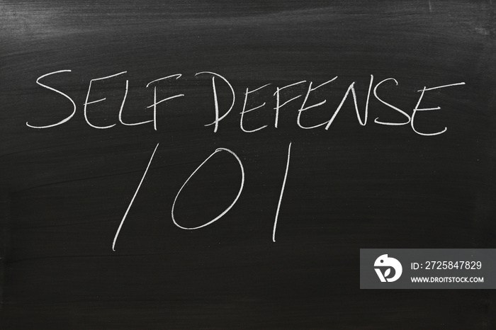 The words  Self Defense 101  on a blackboard in chalk