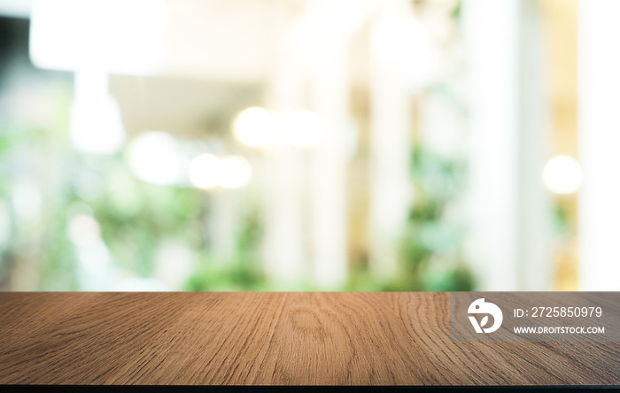 Wood Table Top in Blur Background room interior with empty copy space.